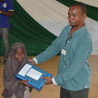 Best Overall Performer Receiving An Award From The Program Officer Mohamed Chamzuzu