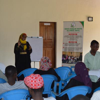 Field Officer Saumu Mwinyi Facilitates During Learning Circle Meeting